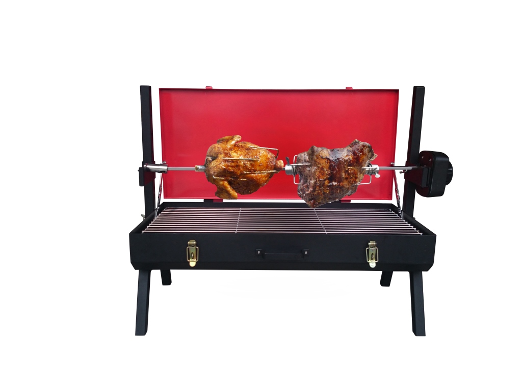 This photo shows a whole chicken cooking on a Mini Spit Roaster